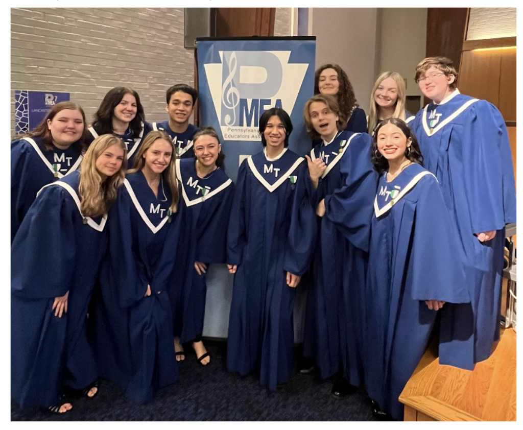 High school students wearing choir robes 
